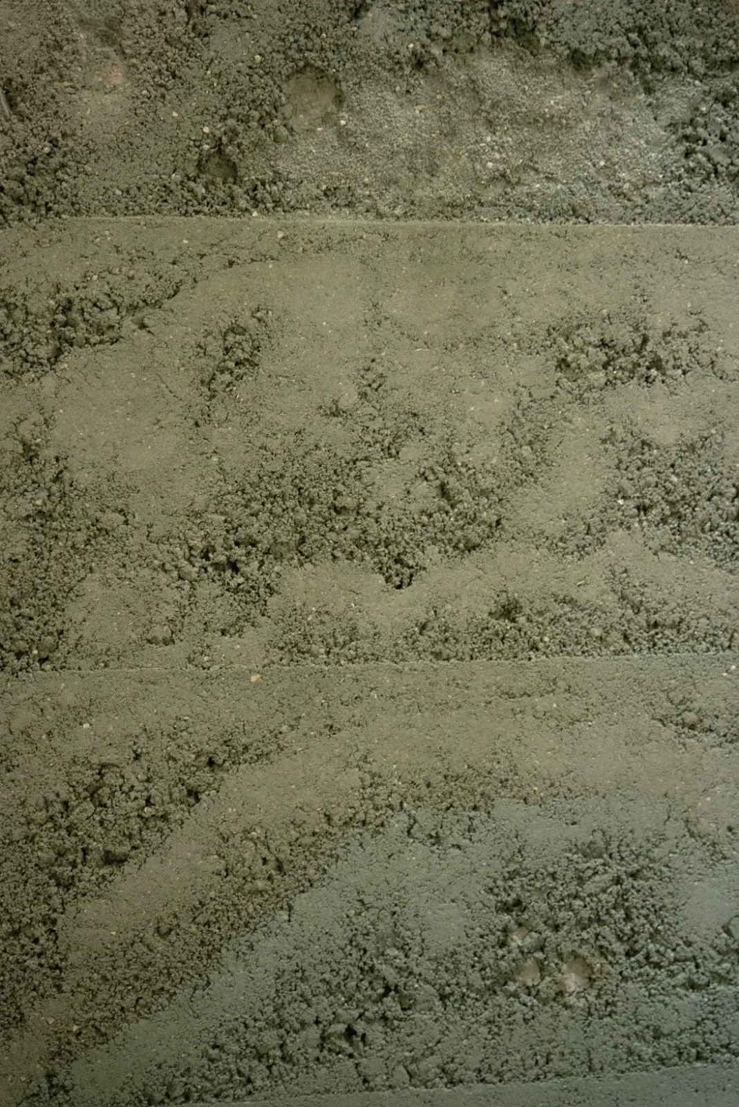 Close-up of the layered green earth strata of Terre Verte by Adam Weismann