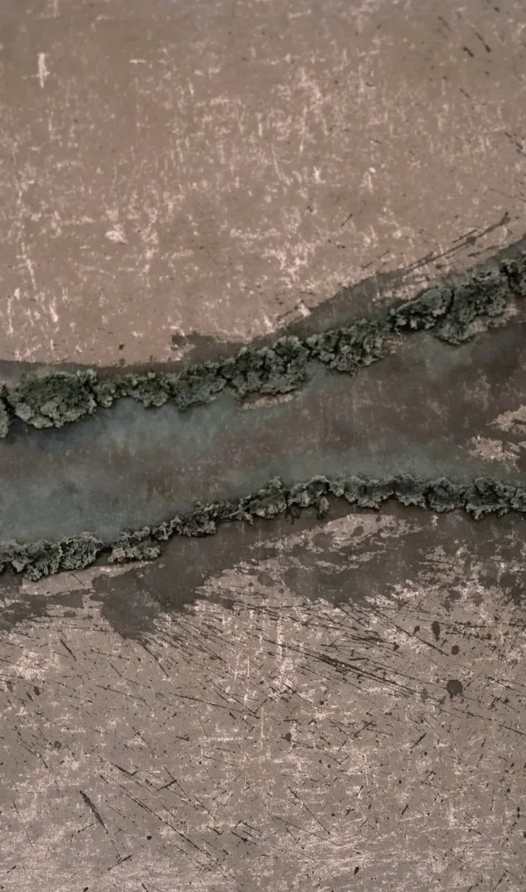 Close-up of Unearthing Series #2 by Eleanor Herbosch showing two ridges of raised London Clay converging across the canvas