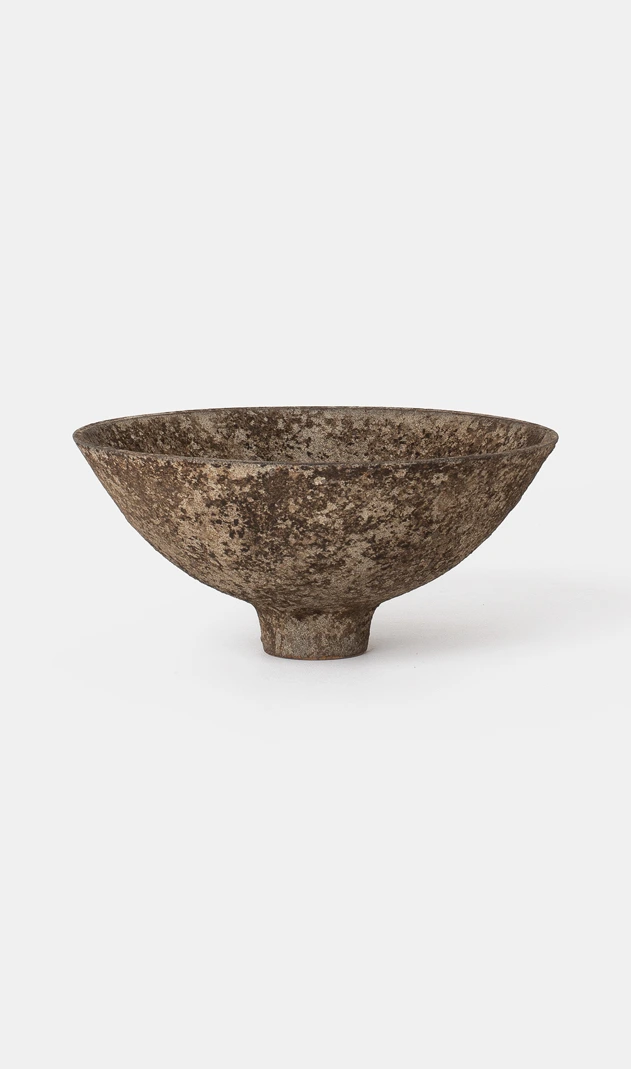 Bowl II by Louis Vincent, a wide shallow footed bowl with a mottled brown and stone-coloured surface, seen from the side