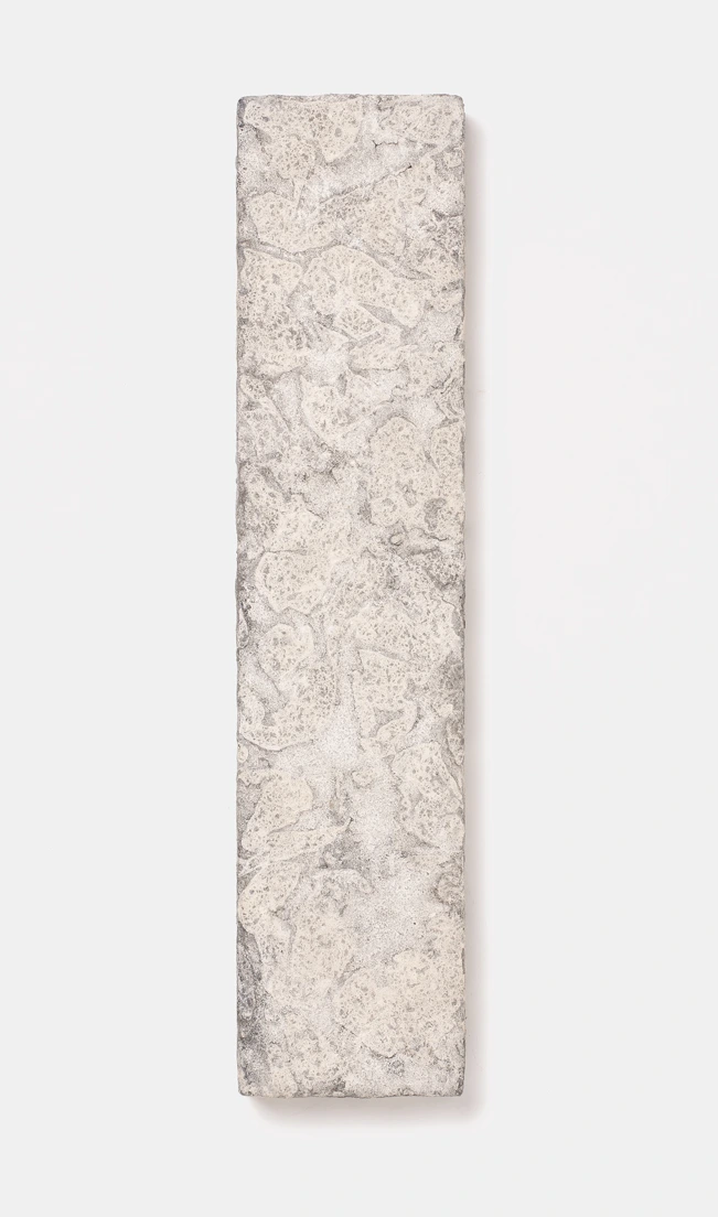 Wall Panel III by Louis Vincent, a narrow pale panel with a cream and grey textured clay surface