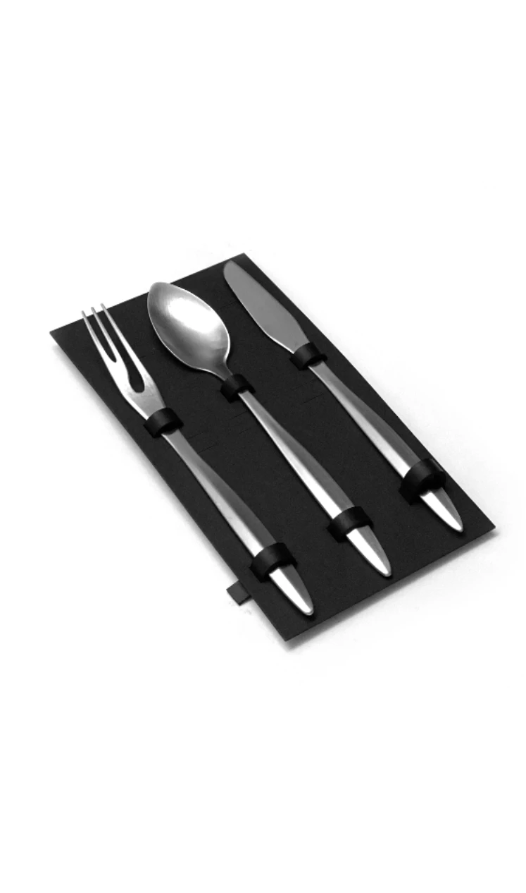 Cutlery Set by Rickie Cheuk, a stainless steel fork, spoon and knife held in a black leather roll